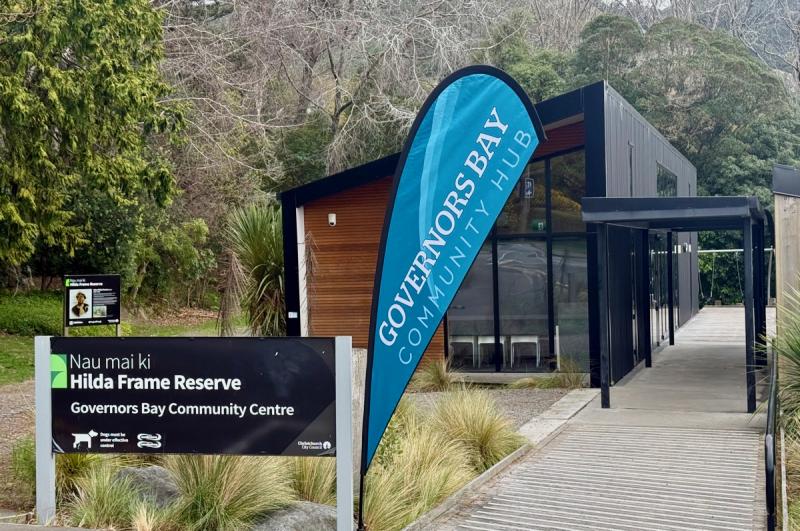 View of the Governos Bay COmmunity Centre form the road showing a blue banner saying Community Hub